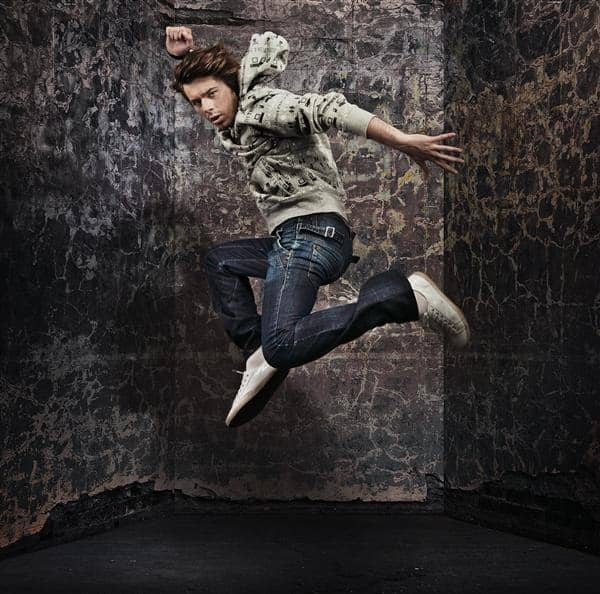 Male Dancer Over Grunge Wall