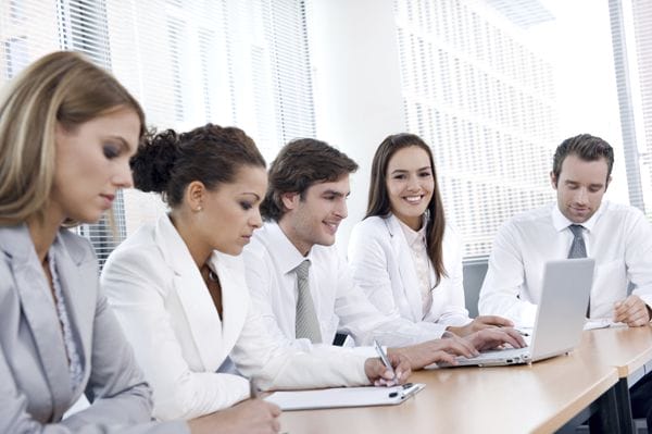 Business people sitting together in meeting