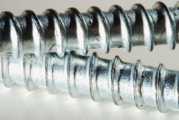 Close up of two screw’s rifle on white background Close up of two screw’s rifle on white background